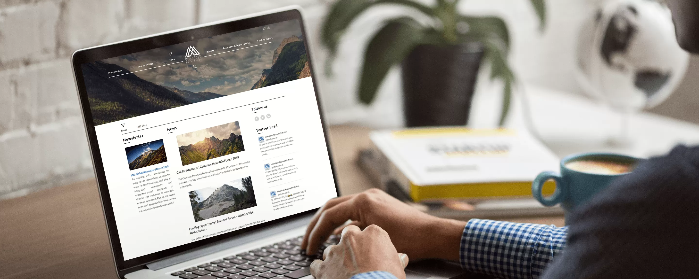 Vorschaubild der Webseite Mountain Research Initiative auf Notebook